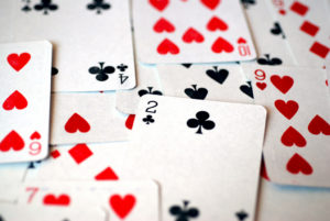 Traditional playing cards have a pictorial representation of the number.